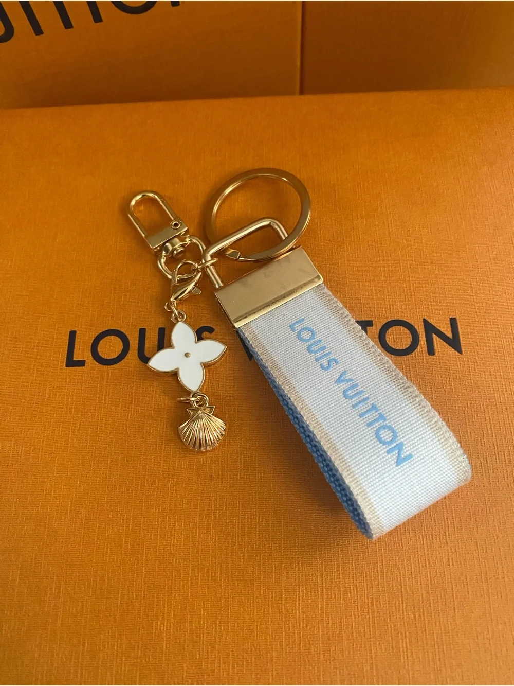 Louis Vuitton White and Light Blue Ribbon Keyring with Gold Hardware